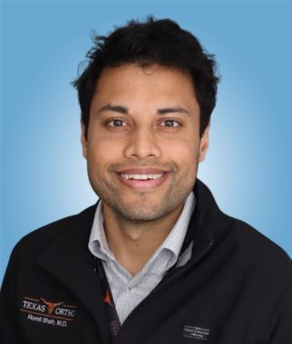 Dr Romil