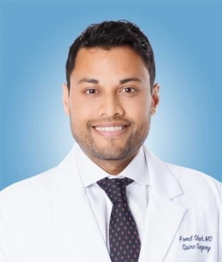 Dr Romil
